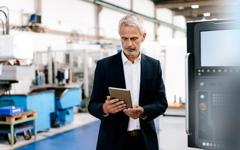 manager-using-digital-tablet-in-high-tech-company.jpg manager-using-digital-tablet-in-high-tech-company.jpg