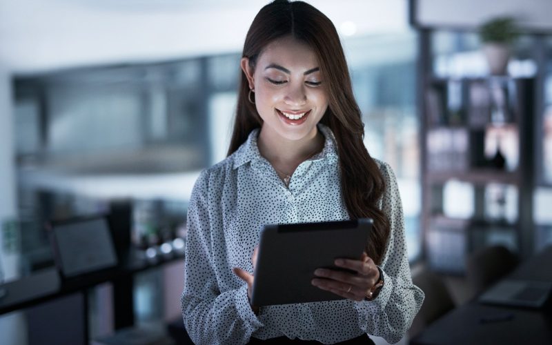 shot-of-a-young-businesswoman-using-a-digital-tablet-in-an-office-at-night.jpg Best AI Based Digital Marketing Agency